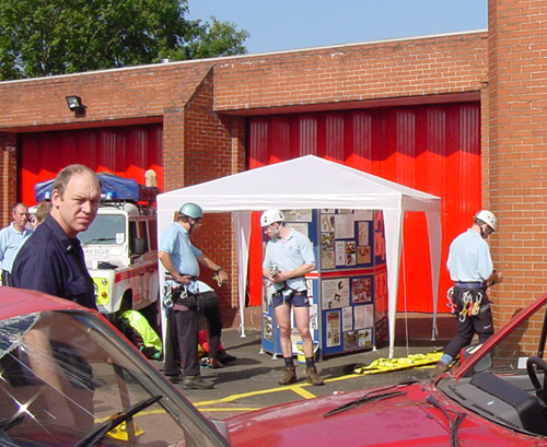 Team members outside the garage in 2002, before we knew it was to be offered to us.