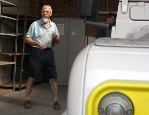 Tony McNally - master in charge of the moving day - awaits the vans at the Fire Station.