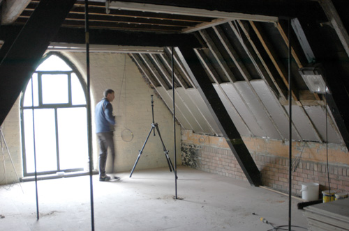 Main lecture area, now with flooring and ceiling insulation in place.